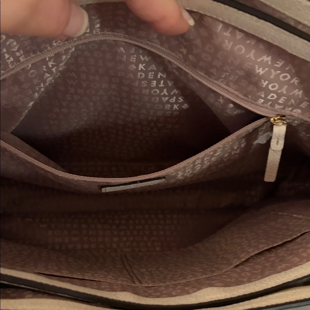 Kate Spade New York leather women’s Natacha Lovett street ivory satchel.